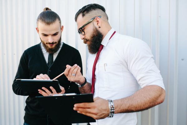 two-businessmen-discussing-something-2021-08-26-17-18-07-utc.jpg